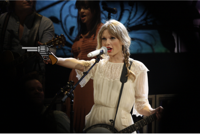 Photo of Taylor Swift edited with a gun