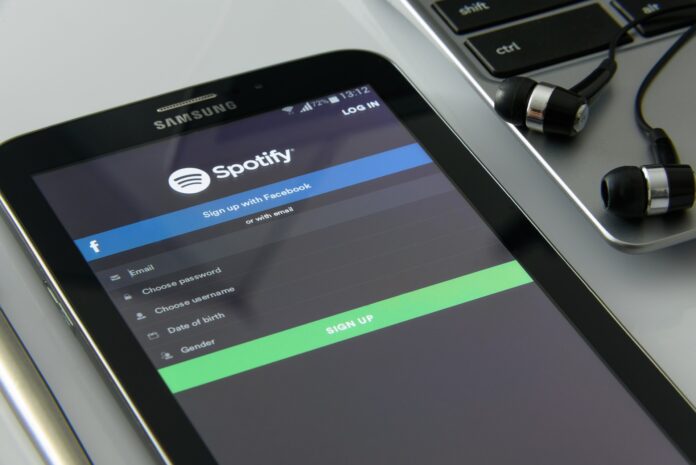 A tablet with the Spotify sign up page on screen.