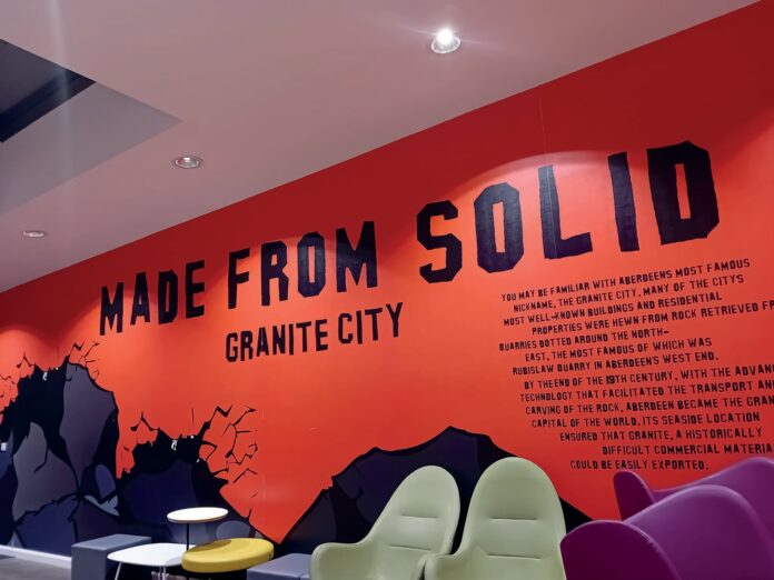 A wall with the words 