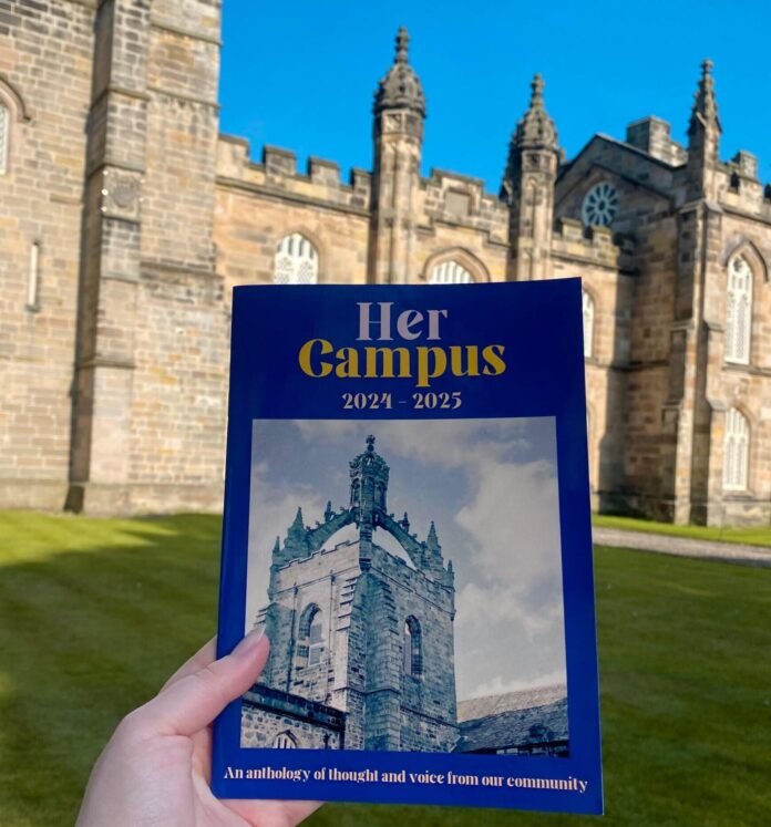 A copy of Her Campus 2024-2025 with University of Aberdeen campus in the background