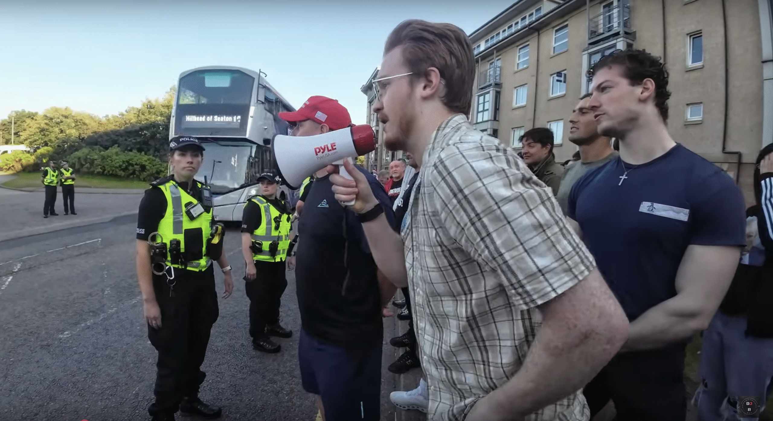Chris Carty with megaphone and Lewis Carty behind, 2nd August, Links Road (Source: DJ R Media) Chris Carty with megaphone and Lewis Carty behind, 2nd August, Links Road (Source: DJ R Media)
