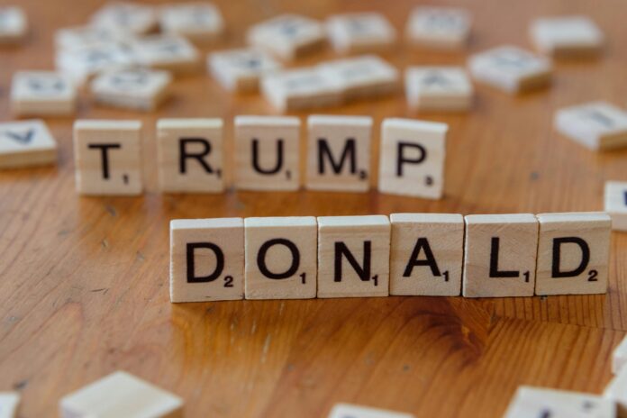 Scrabble letters spelling 'Donald Trump'