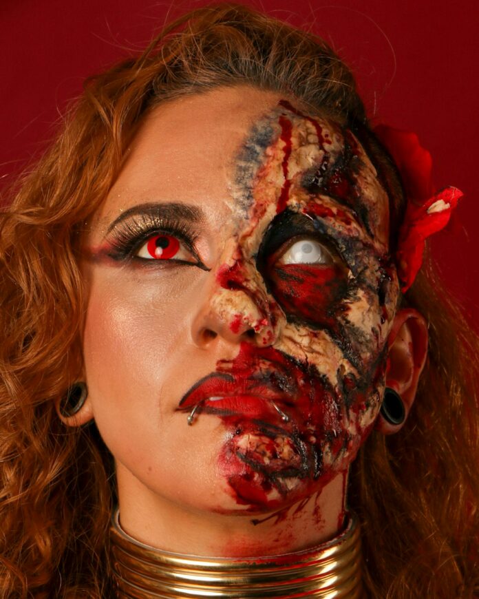 Woman with red eyes and costume makeup