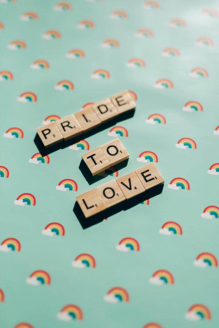 'Pride to Love' spelt in scrabble tiles